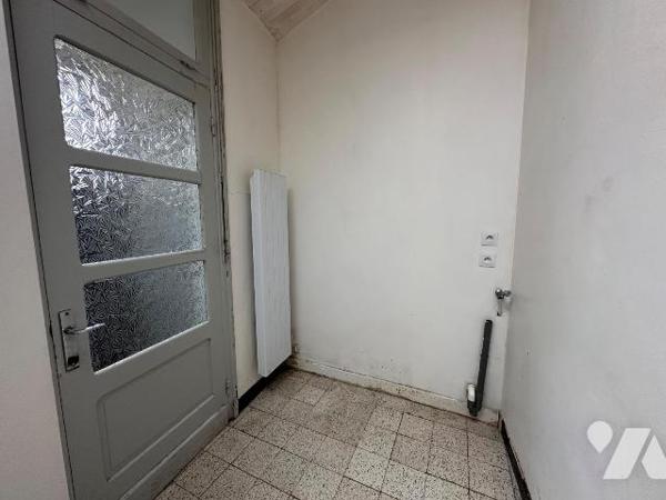 Maison mitoyenne située à Gravelines, d'une surface habitable de 100,15 m², offrant un beau pot...