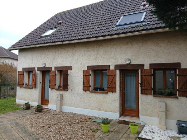 Evreux, dans un quartier calme, maison avec garage.