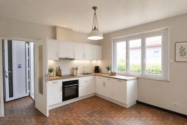 Maison individuelle avec beau terrain clos – Grand-Charmont (25200)