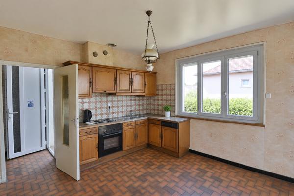 Maison individuelle avec beau terrain clos – Grand-Charmont (25200)