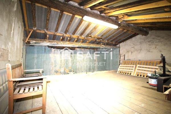 Maison de village avec cour et places de parking