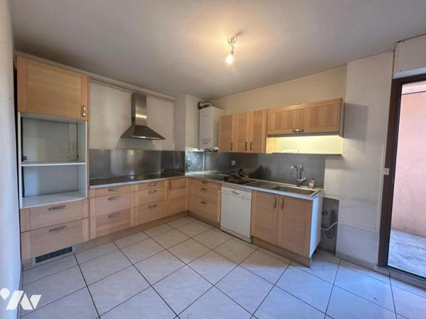 Appartement T4 avec cellier et place de stationnement