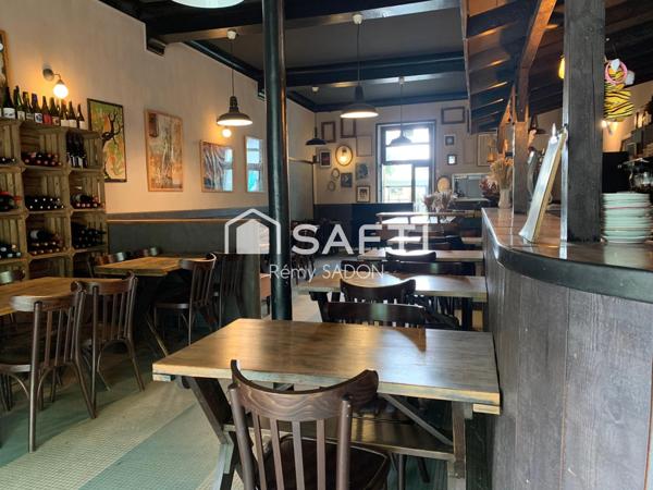 Immeuble (murs commerciaux + appartement 150m2)