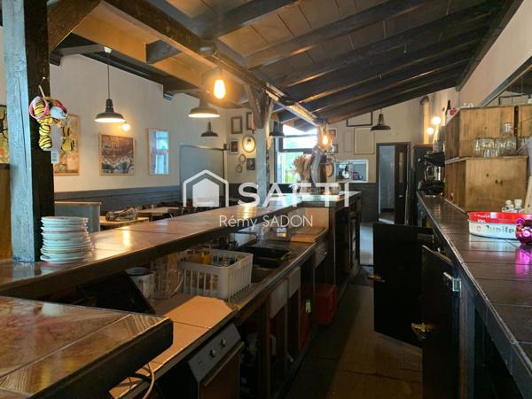 Immeuble (murs commerciaux + appartement 150m2)