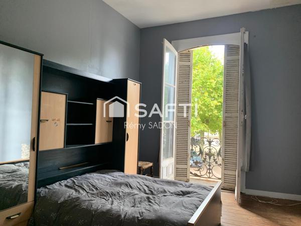 Immeuble (murs commerciaux + appartement 150m2)