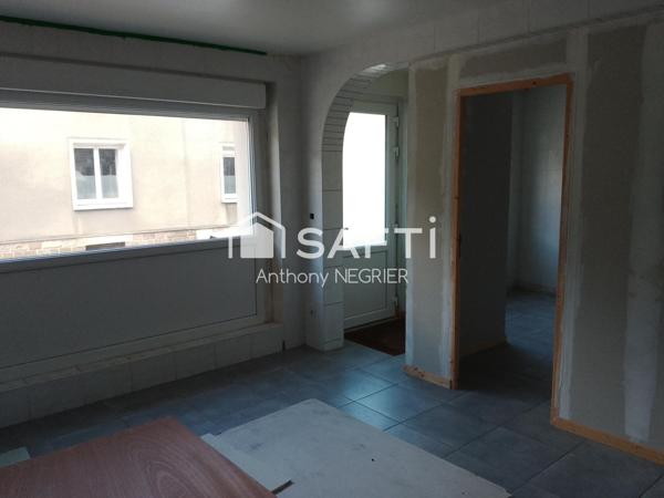 Immeuble de 3 appartements avec caves