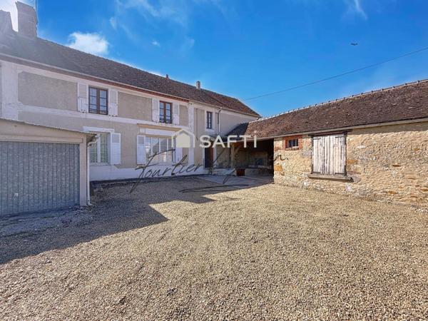 Maison spacieuse avec caves et dépendances !