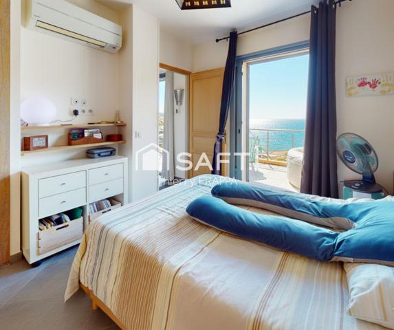 Villa contemporaine pieds dans l'eau, site Natura 2000 entre port de plaisance et réserve de Scandola. 97m², 4 chambres, 30 min aéroport Calvi.