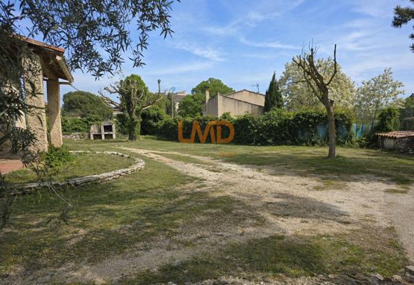 Maison plain-pied, garage, terrain 826 m², au calme avec vue dégagée