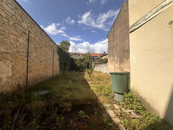 Appartement avec local situé au rez-de-chaussée