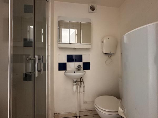 Appartement avec local situé au rez-de-chaussée