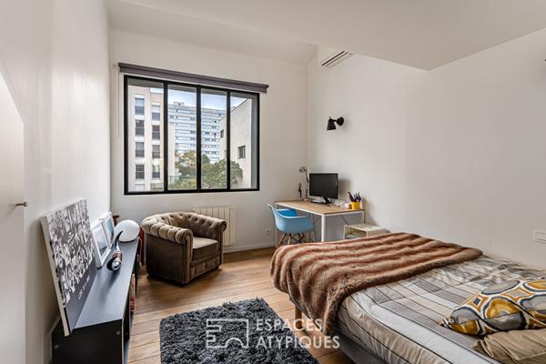 Ancien atelier de mécanique transformé en loft à usage mixte, quartier Gambetta.