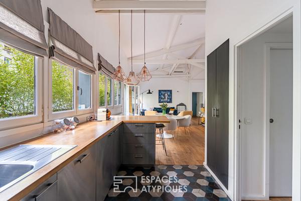 Ancien atelier de mécanique transformé en loft à usage mixte, quartier Gambetta.