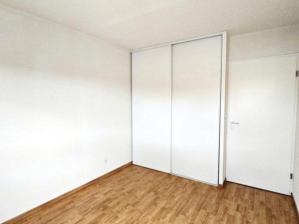 T3 avec balcon et parking couvert