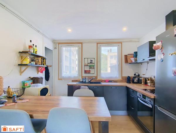 Appartement 3 pièces 49m² + place de parking et 2 caves