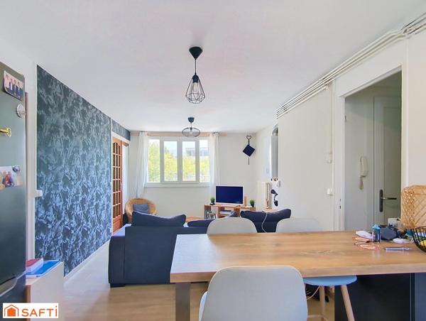 Appartement 3 pièces 49m² + place de parking et 2 caves