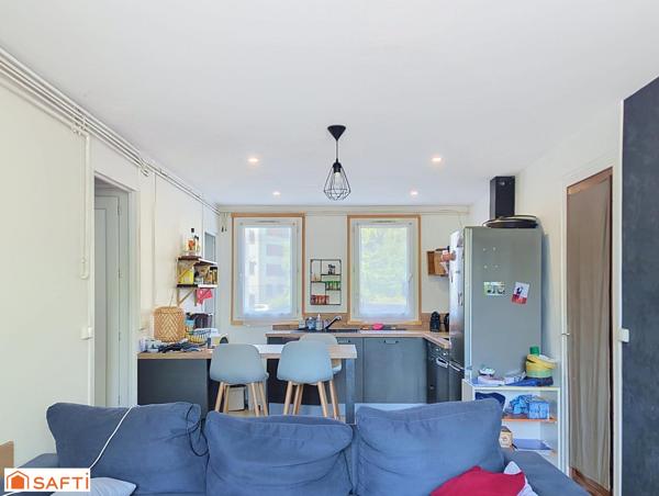 Appartement 3 pièces 49m² + place de parking et 2 caves