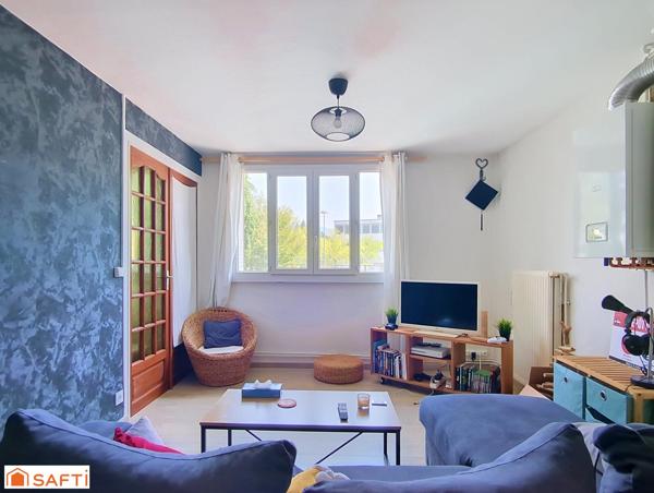 Appartement 3 pièces 49m² + place de parking et 2 caves