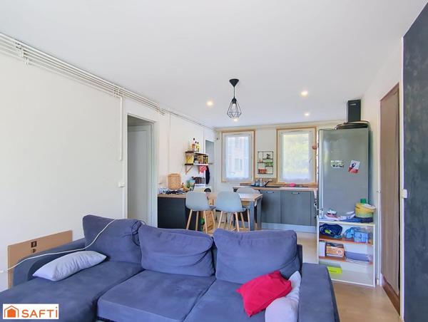 Appartement 3 pièces 49m² + place de parking et 2 caves