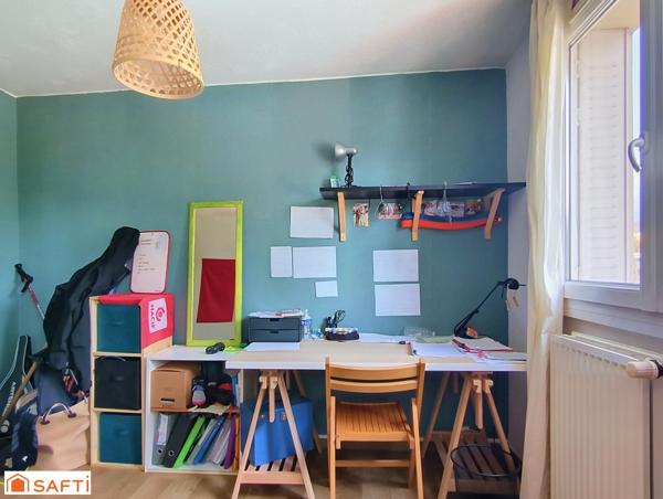 Appartement 3 pièces 49m² + place de parking et 2 caves