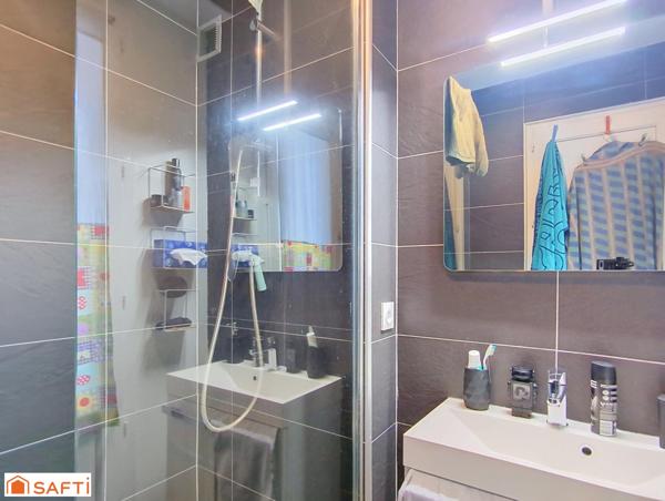 Appartement 3 pièces 49m² + place de parking et 2 caves