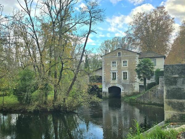 Moulin rénové avec goût et ses jolis volumes