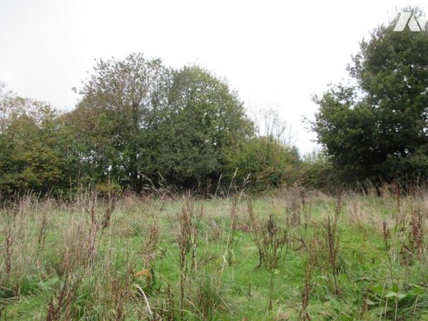 MAGNIFIQUE TERRAIN de 1300m² CONSTRUCTIBLE