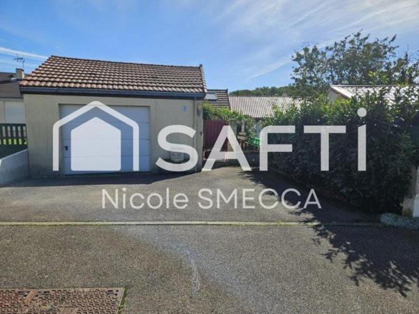 Maison mitoyenne,garage,jardin,terrasse,véranda