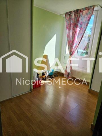 Maison mitoyenne,garage,jardin,terrasse,véranda