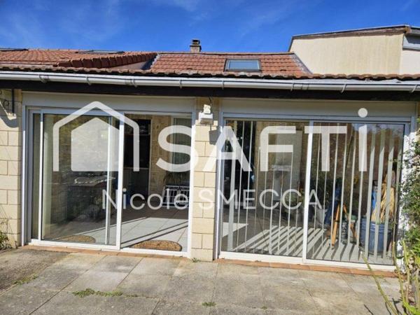 Maison mitoyenne,garage,jardin,terrasse,véranda