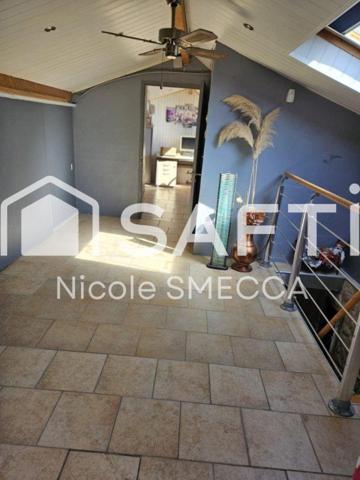 Maison mitoyenne,garage,jardin,terrasse,véranda