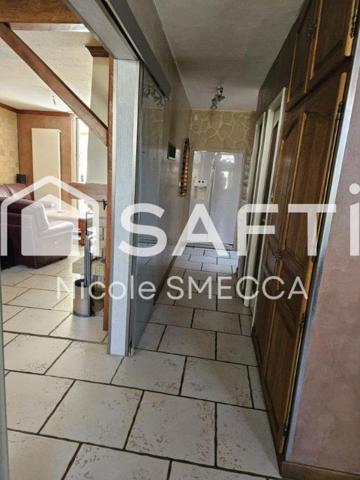 Maison mitoyenne,garage,jardin,terrasse,véranda