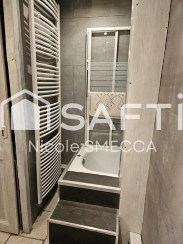 Maison mitoyenne,garage,jardin,terrasse,véranda