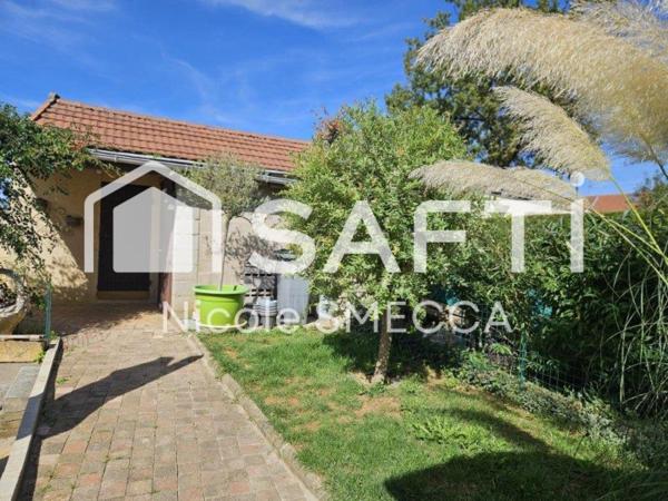 Maison mitoyenne,garage,jardin,terrasse,véranda