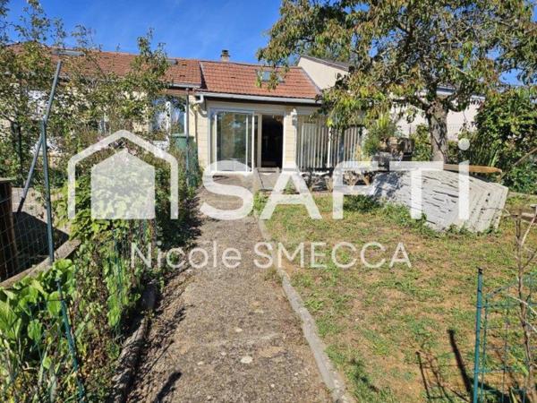 Maison mitoyenne,garage,jardin,terrasse,véranda