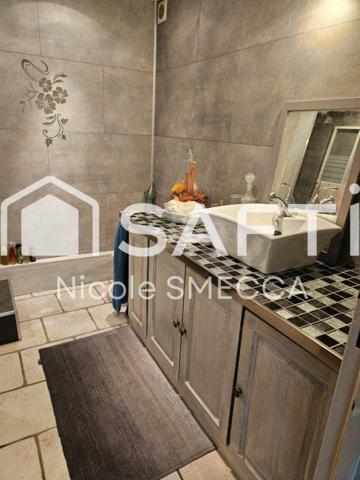 Maison mitoyenne,garage,jardin,terrasse,véranda