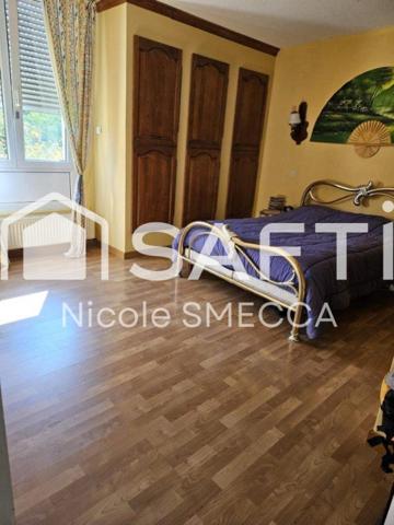 Maison mitoyenne,garage,jardin,terrasse,véranda