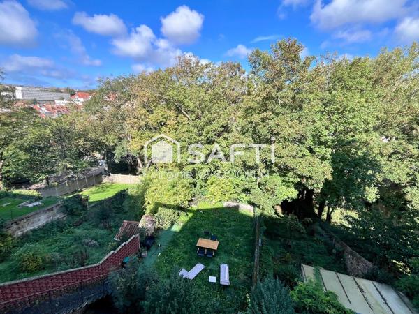 Appartement lumineux, balcon et face aux remparts