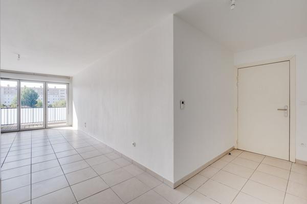 Appartement T3 66m2 avec balcon et parking s/s