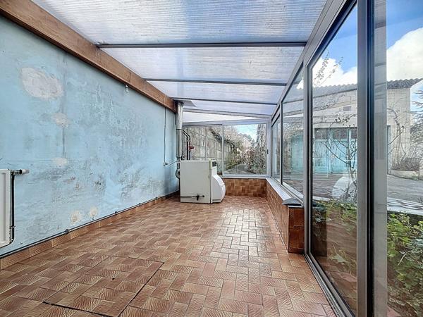 Maison avec garage et jardin