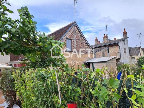 Coeur de ville, maison de plain pied