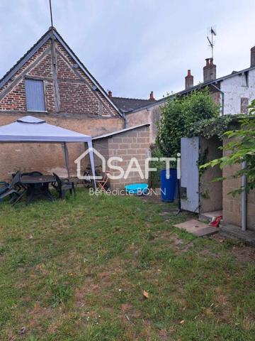 Coeur de ville, maison de plain pied