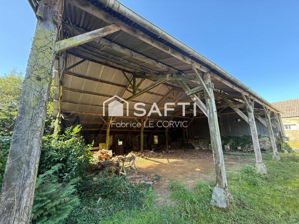 Ancien corps de ferme avec hangars
