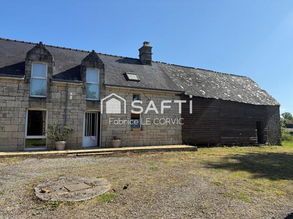 Ancien corps de ferme avec hangars