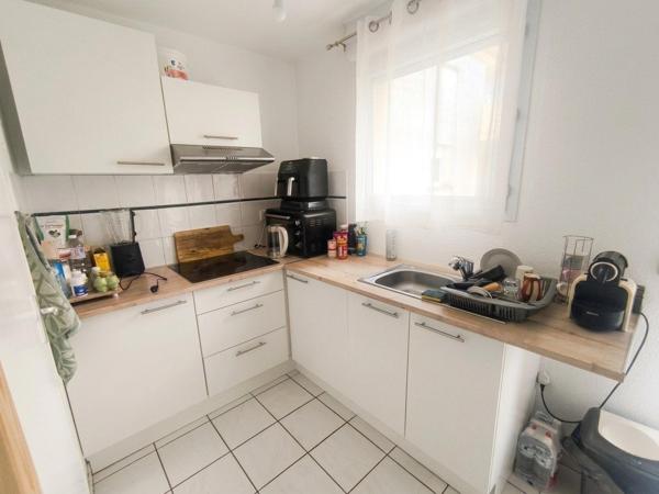 T2 avec piscine et parking à 5 min du centre