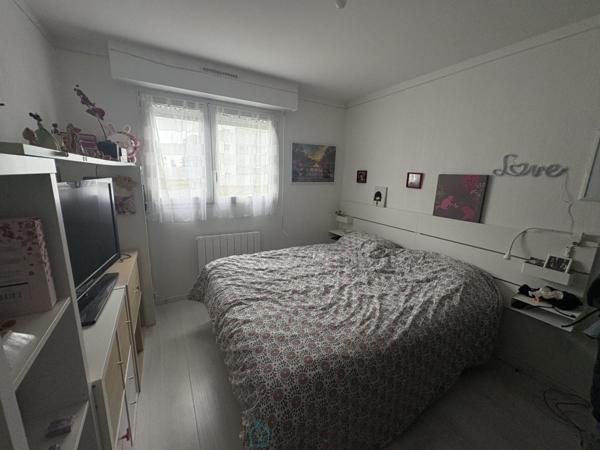 Appartement T5 de 103 m2 avec terrasse et garage.
