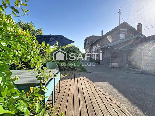 Maison en brique de 150m2 avec garage et dépendances