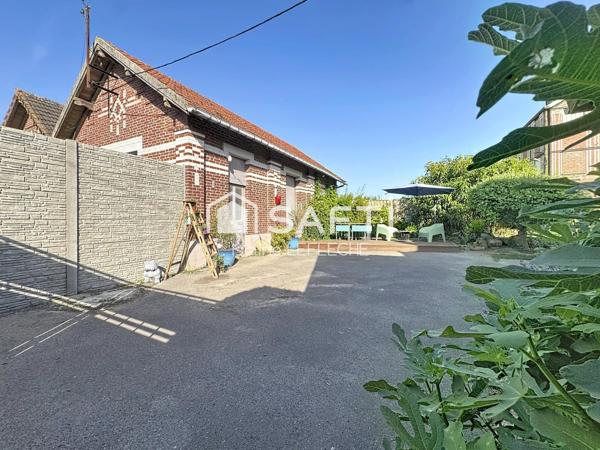Maison en brique de 150m2 avec garage et dépendances