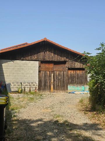 Dépôt 102 m² avec belle hauteur et mezzanine possible – Idéal artisan ou stockage