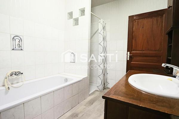 Maison bi-famille de 233 m² avec jardin, verger et garage